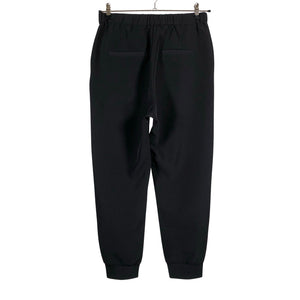 Unisex Lindex - Mittevenivad püksid, suurus 38 - Must (2)