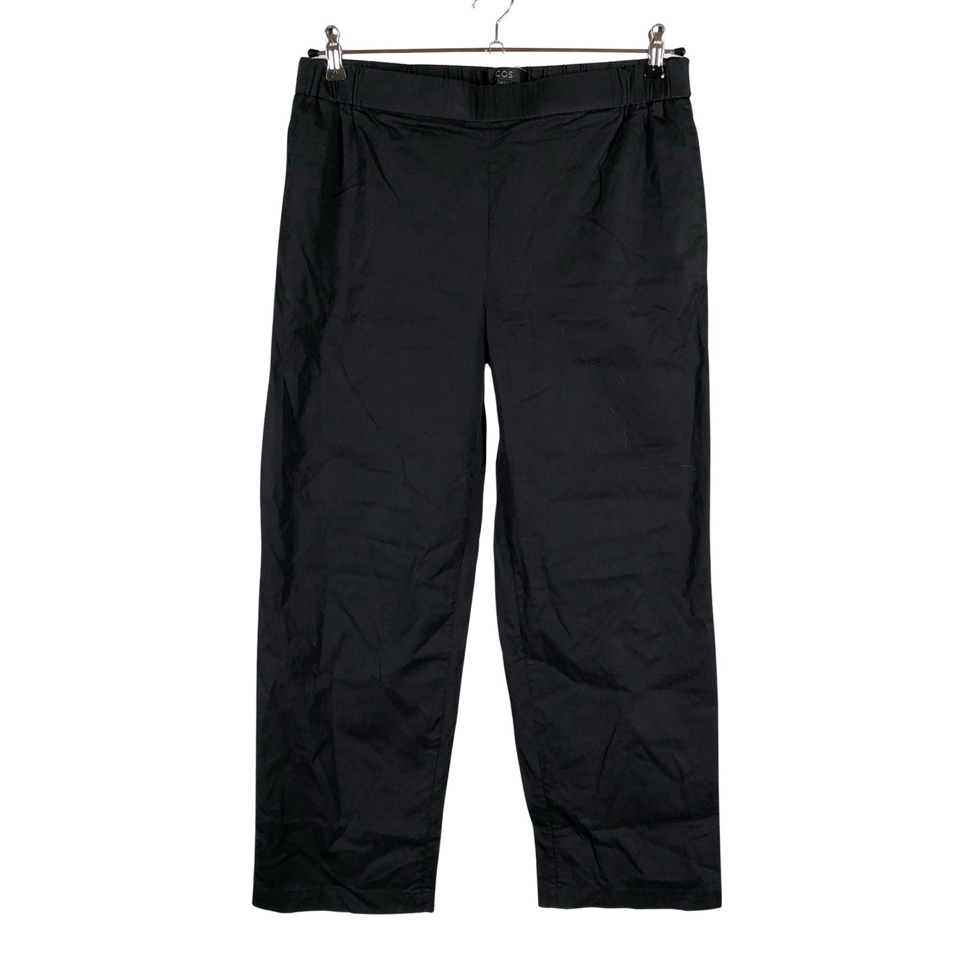 Unisex COS - Mittevenivad püksid, suurus 40 - Must (1)
