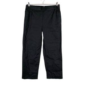 Unisex COS - Mittevenivad püksid, suurus 40 - Must (1)