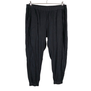 Unisex NOSH - Mittevenivad püksid, suurus 46 - Must (1)