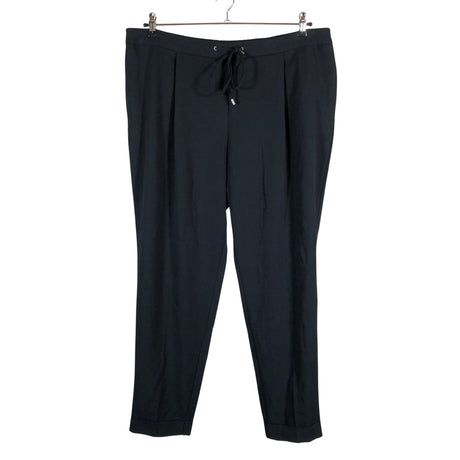 Unisex Marks&Spencer - Mittevenivad püksid, suurus 48 - Must ()