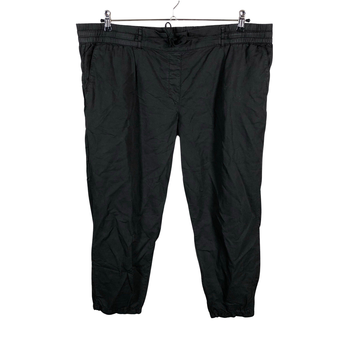 Unisex Voglia - Mittevenivad püksid, suurus 44 - Must (1)