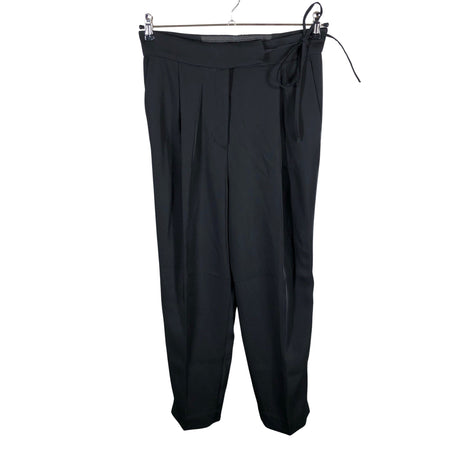 Unisex COS - Mittevenivad püksid, suurus 38 - Must ()