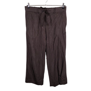 Unisex COS - Mittevenivad püksid, suurus 40 - Pruun (1)