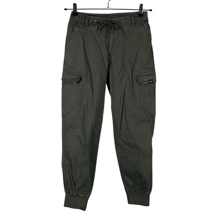 Unisex Reell - Mittevenivad poolpikad püksid, suurus 34 - Roheline ()