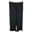 Unisex Second Female - Mittevenivad püksid, suurus 40 - Must ()