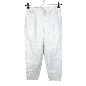Unisex COS - Mittevenivad püksid, suurus 36 - Looduslik valge (1)