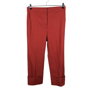 Unisex COS - Mittevenivad poolpikad püksid, suurus 38 - Punane (1)