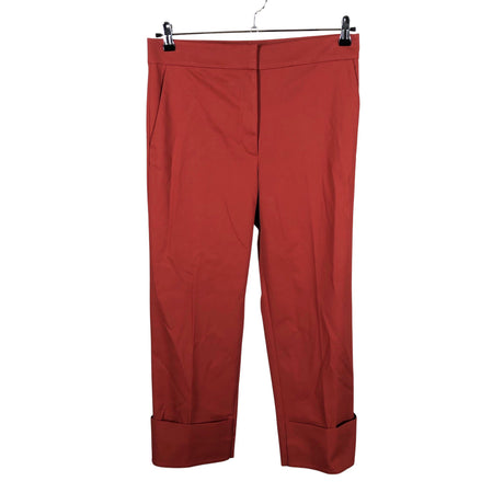 Unisex COS - Mittevenivad poolpikad püksid, suurus 38 - Punane ()
