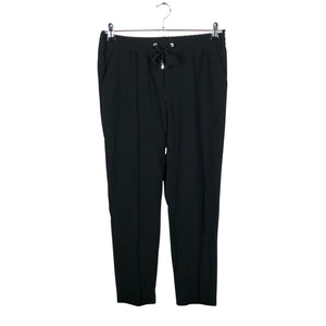 Unisex Filippa K. - Mittevenivad püksid, suurus 38 - Must (1)