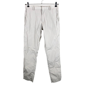 Unisex COS - Mittevenivad püksid, suurus S - Beige (1)