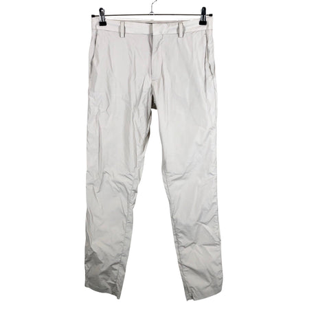 Unisex COS - Mittevenivad püksid, suurus S - Beige ()