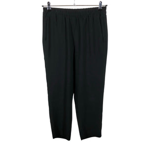 Unisex Lindex - Mittevenivad püksid, suurus 36 - Must (1)