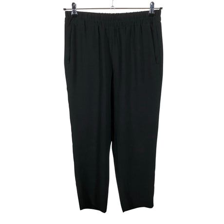Unisex Lindex - Mittevenivad püksid, suurus 36 - Must ()