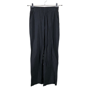 Unisex R-collection - Mittevenivad püksid, suurus 36 - Must (1)