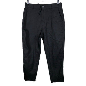 Unisex Uniqlo - Mittevenivad püksid, suurus 40 - Must (1)