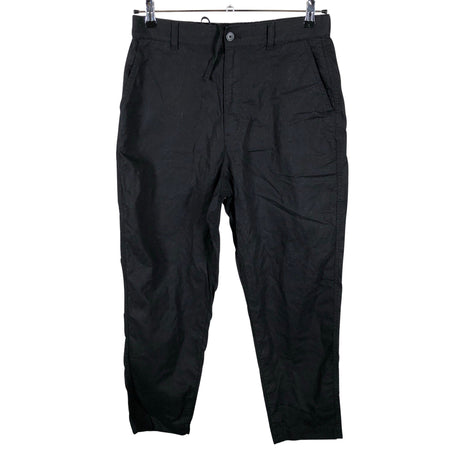 Unisex Uniqlo - Mittevenivad püksid, suurus 40 - Must ()