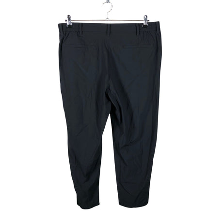 Unisex Uniqlo - Mittevenivad püksid, suurus XL - Must (2)