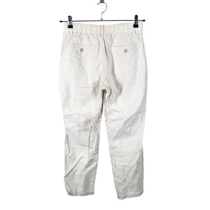 Unisex Uniqlo - Mittevenivad püksid, suurus XS - Beige (2)