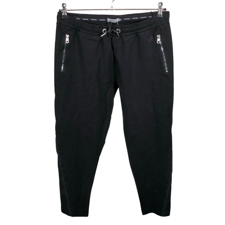 Unisex Calvin Klein Jeans - Trikotaažist püksid, suurus 40 - Must ()