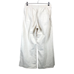 Unisex COS - Mittevenivad püksid, suurus 44 - Beige (2)