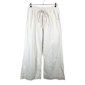 Unisex COS - Mittevenivad püksid, suurus 44 - Beige (1)