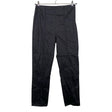 Unisex Collectif - Mittevenivad püksid, suurus 38 - Must ()