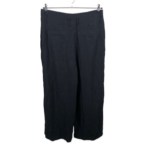 Unisex COS - Mittevenivad püksid, suurus 42 - Must (2)