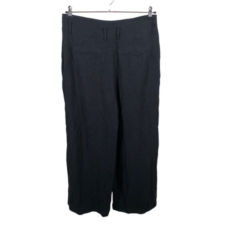 Unisex COS - Mittevenivad püksid, suurus 42 - Must (2)