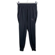 Unisex Puma - Soojenduspüksid, suurus XS - Must ()