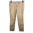 Unisex Guess - Mittevenivad püksid, suurus W25 - Pruun ()