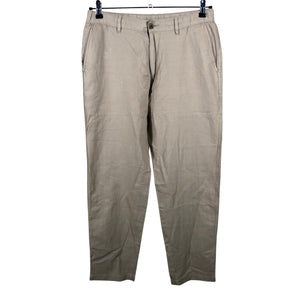 Unisex Uniqlo - Mittevenivad püksid, suurus M - Beige (1)