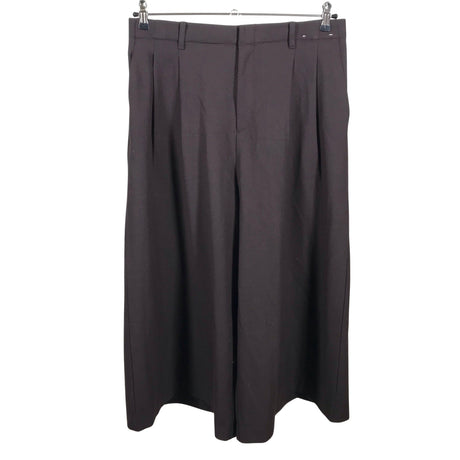 Unisex Uniqlo - Mittevenivad püksid, suurus 42 - Pruun ()