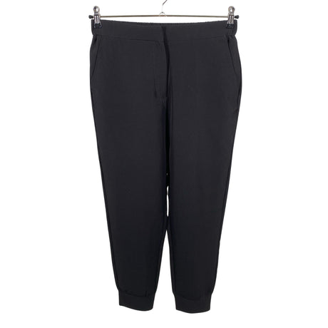 Unisex Lindex - Mittevenivad püksid, suurus 36 - Must ()