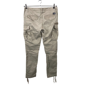 Unisex Jack & Jones - Mittevenivad püksid, suurus W30 - Pruun (2)