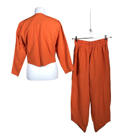 Unisex Petuliina - Mittevenivad püksid, suurus 38 - Oranž (2)