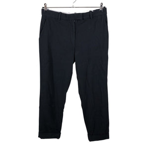 Unisex COS - Mittevenivad püksid, suurus 32 - Must (1)