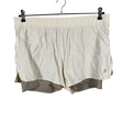 Unisex Peak Performance - Lühikesed spordipüksid, suurus 42 - Beige ()