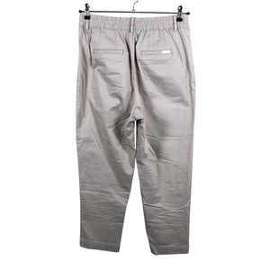 Unisex Noom - Mittevenivad püksid, suurus 38 - Beige (2)