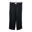 Unisex Voglia - Mittevenivad püksid, suurus 40 - Must ()