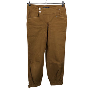 Unisex Nikita - Mittevenivad püksid, suurus W27 - Pruun (1)