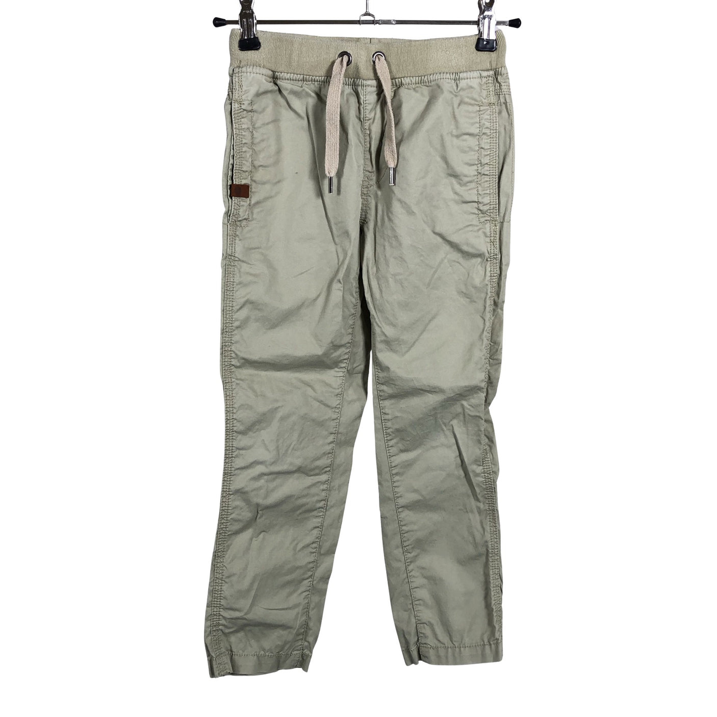 Unisex POMPdeLUX - Mittevenivad püksid, suurus 110 - 116 - Beige (1)