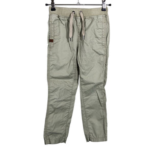 Unisex POMPdeLUX - Mittevenivad püksid, suurus 110 - 116 - Beige (1)