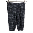 Unisex Lindex - Mittevenivad poolpikad püksid, suurus 104 - 110 - Must ()
