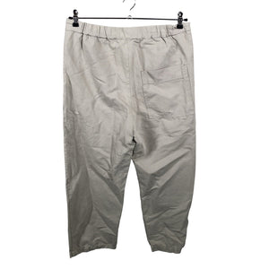 Unisex COS - Mittevenivad püksid, suurus 36 - Beige (2)
