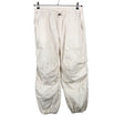 Unisex Marks&Spencer - Mittevenivad püksid, suurus 38 - Beige ()