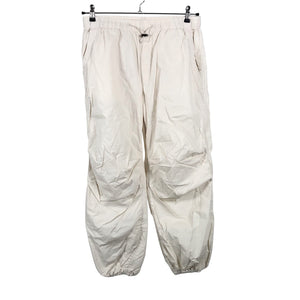 Unisex Marks&Spencer - Mittevenivad püksid, suurus 38 - Beige (1)