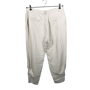 Unisex Newpenny - Mittevenivad püksid, suurus 42 - Beige (2)