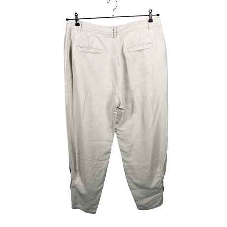 Unisex Newpenny - Mittevenivad püksid, suurus 42 - Beige (2)