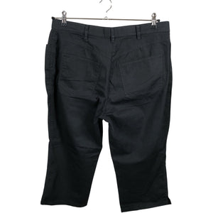 Unisex Voglia - Mittevenivad poolpikad püksid, suurus 44 - Must (2)
